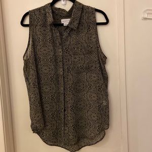 Liz Claiborne black and white sheer blouse. It buttons down with a pocket.